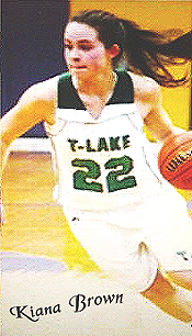 Kiana Brown, Trinagle Lake High School (Oregon), number 22, driving with the ball, upcourt.