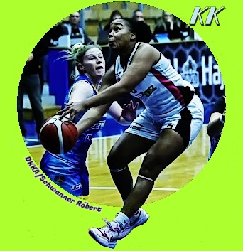 Photo of Kirsten (KK) Deans, women's basketball player for the David Kornel team in the A Division league in Hungary. Shown up in the air about to shoot a shot. DDKA/Schwanner Rbert