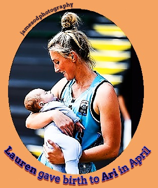 Lauren Nicholson holding her v3 month old baby boy, Ari, in Ju;y when she scored 48 points in a game, then two weeks later, 51!. jamesodphotography