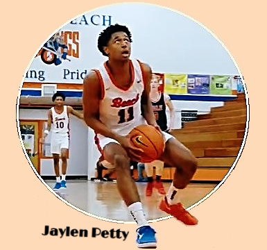Image of State of Washington's Rainier Beach High School's Jaylen Petty show in uniform #11 poised to leap for a lay-up.