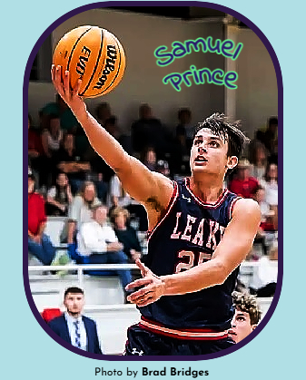 Samuel Prince, Leake Academy basketball player in Mississippi shown about to score a one handed basket in #25 jersey. Photo by Brad Bridges.