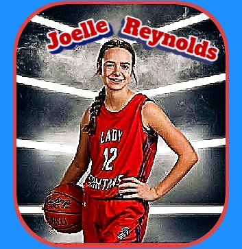 Image of Joelle Reynolds. Waltonville High School girls basketball player, posing, ball on her right hip, in her red #14 Lady Spartans uniform.