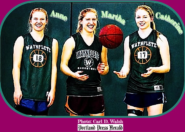 The Veroneau sisters, Waynflete High School, Maine. From left to right, in green uniforms, #18 is freshman Anne, Martha in center and Catherine (#17) on the right, are seniors and twins. From the Portland Press Herald, Portland, Maine, January 31, 2013. Photographer: Carl D. Walsh.