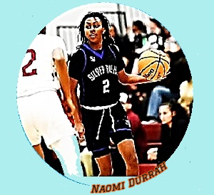 Silver Valley High School girl basketeer Naomi Durrah in her #1 uniform, dark blue with white trim and lighter blue V collar looking tp make a play.