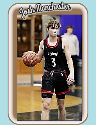 /mount Hoeb High (Wisconsin) Viking basketball player Josh Manchester, bringing a ball upcourt, looking to make a play in his black uniform with red trim and a scripted Vikings and his number 3.