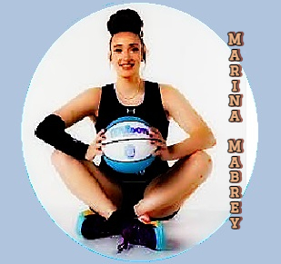 Marina Mabrey, Lunar Owls, Unrivaled Basketball League, 2026, women's basketball. Sitting cross legged holding basketball with both hands in lap. bun atop.