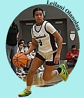 #5, Riverbank High's Leilani Olanolan, Californian girls basketball player dribbling the ball.