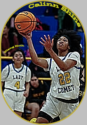 Calinn Shine, girls basketball player for Classen SAS, Oklahoma, hoing up for a layup in LADY COMET uniform #22. #4, Niang Hoih, looking on.