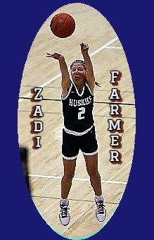 Zadi Farmer, Jackson County Central High School girls basketbaLL PLyer shoots the ball in her black HUSKIES UNIFORM #2.