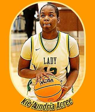 Kie'Aundria Acree  is a girls basketball player in Georga playing for the Monroe High School Golden Tornadoes, here seen shooting a free throw in her #12 LADY TORNADOES jersey.