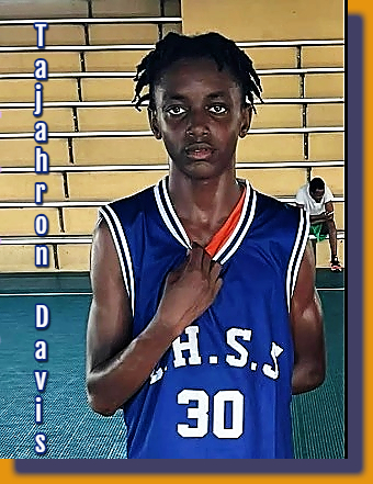 Tajahron Davis, Clare Hall Secondary School basketball player in Antigua and Barbuda, shown standing in his blue C.H.S.S. number 30 jersey.
