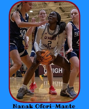 Nanak Ofori-Mante, girls basketball player for Chicago University Labiratory School in a game versus Francis W. Parker School on Feb. 10, 2026, looking for a shot while being guarded by two defenders. Photo by Bryce Kenny.
