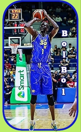 Bol Bol, seven foot-2 inch basketball player for Talk N' Text team in the Philippine Basketball Association. Shown in blue #56 uniform shooting a two handed overjhead jump hot.