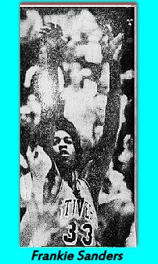 Image of Frankie anders, boys basketball star at Stivers High School, Ohio, show after shooting a shot in uniform #33. From The Journal Herald, Dayton, Ohio, March22, 1975.