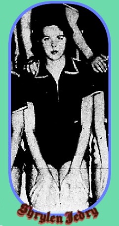 From a team photo, on her knees, hands on thighs in collared uniform. From The Orange Leader, Orange, Texas, /January 29, 1961.