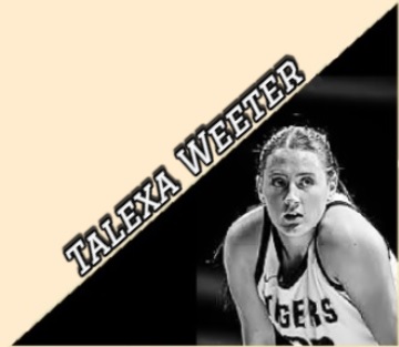 Telexa Weeter, Fort Hays State woman basketball player, close-up during a game in her TIGERS uniform.
