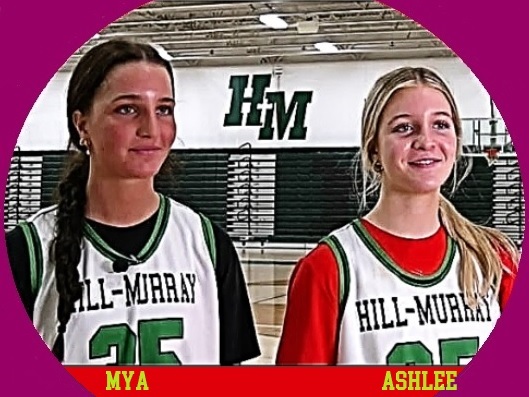 The Wilson Sisters, Mya, #35, on the left, Ashlee, #25, on the right, in green and white HILL-MURRAY uniforms, for Hill-Murray High School in Minnesota.