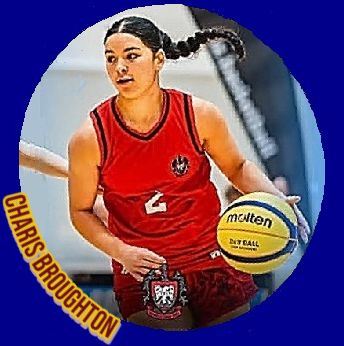 Charis Broughton, in red uniform #2 looking to make a play with a yellow basketball for Mount Maunganui College, New Zealand.