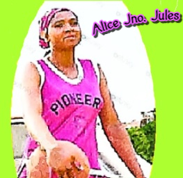 Alice Jno. Jules in her pink Pioneers uniform, , sitting with basketball in her right arm.