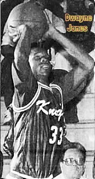 Image of Louisiana boys basketball player, Dwayne Jones, #33, in black uniform with script 'Knights' on front, shooting a jump shot. Photo by Jim Hudelson, The Times, Shreveport, Louisiana, February 12, 1995.