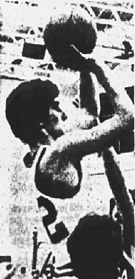Image of Jim Kollar, boys basketball player for Derry Area High, shooting to the right. From The Latrobe Bulletin, Latrobe, Pennsylvania, 2/16/1983.