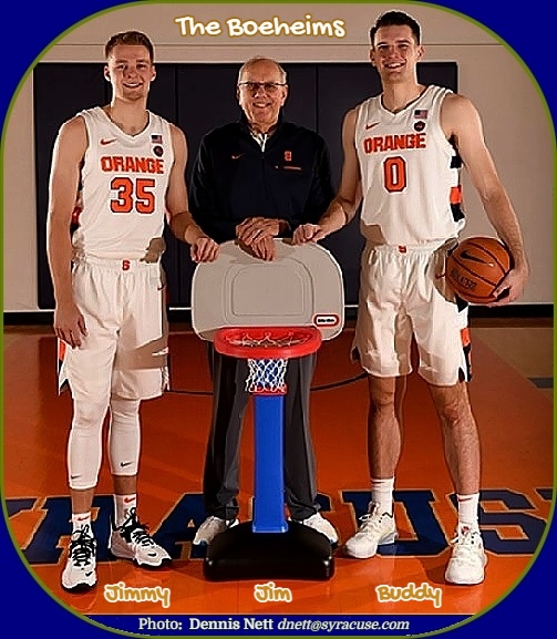 Image of the Bonheims, Jimmy, #35, coach Jim and Buddy, #0, standing & posing. Buddy w basketball. White ORANGE uniforms with orange lettering. Photo by Dennis Nett, syracuse.com