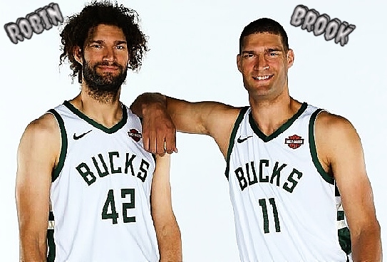 Image of the Lopez brothers, standing, in BUCKS uniforms (Milwaukee Bucks of the NBA). Brook, #11, with his right arm leaning on bearded Robin, number 42..