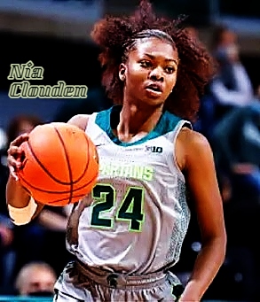 Image of Michigan State's women's basketball player, Nia Clouden, #24, shown in light colored SPARTANS uniform, shown dribbling basketball