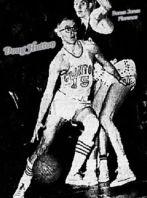 Image of basketball player Doug Hutton, Clinton High School, Nississippi, #15, shown dribbling around David (Bones) Jones of Florence, in game when Hutton scored 54 points  in the state class A-AA championship game, at Jackson. From The Clarion-Ledger, Jackson, Miss., March 6, 1960. Photo by Norm Bergsma.