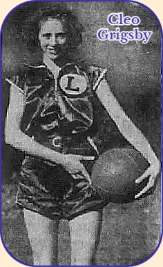 Image of Tennessee girl basketball player, Cleo Grigsby, Loudon High School, posing, holding basketball, with both hands, at left hip, in uniform with large L in a circle on it.