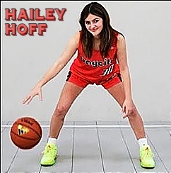 Picture of Hailey Hoff, Capuchino High School basketball player, in red uniform, bending over nd dribbling a ball.