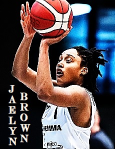 Basketball player Jaelyn Brown, in her number 1 Norrkoping Dolphins uniform (Swedish Women's League) shooting a left handed shot to our left.