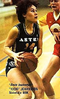 Image of Swedish League women's basketball player, Kicki Johansson, in her ASTRA #14 uniforn, guarded, crouched and looking to shoot.