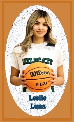 Image of Leslie Luna, basketball player for the Wendover High School girls basketball team, posing in white WILDCATS t-shirt holding a basketball. She holds the girls record for most points in a game for the state of Utah, scoring 55 points in a 2021 game.