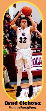 Photo (by Randy Perez) of Montana basketball player Brad Cichosz of the Harlem High School Wildcats, high up in thair in his #32 uniform, shooting a jump shot.