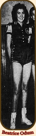 Photo of Beatrice Odum, Cloudland High School girls bsketball player, in Tennessee, standing with hands behind her back, in uniform with C on it. We see partial image nex to her left, teammate Blanche Hass. From the Sunday Press-Chronicle, Johnson City, Tenn., January 19, 1941.