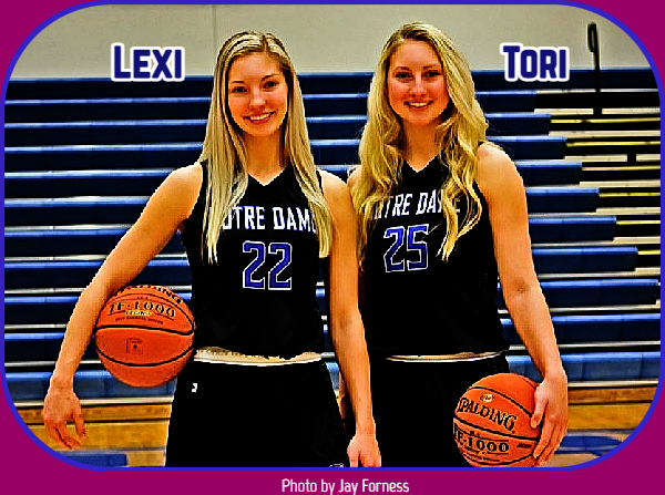 Image of the the Rubel sisters, Lexi, number 22, on the left, Tori, #25 on right. Blue lettering on dark uniforms for ape Girardeau High School, Missouri girls basketball team..