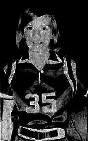 Photo of 1960s girl basketball player, Sue Ann Phillips, Putnam County High School (Georgia), posing, holding ball n left hip, in satin warm up jacket, number 35. From The Macon, Telegraph, Macon, Georgia, February 4, 1967.