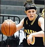Image of Shaylee Brown, Salem High School, Indiana, basketball player shown in game with ball, The Courier-Journal, Louisville, Kentucky, April 15, 2007.