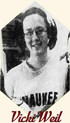 Image of girls basketball player Vicki Weil, Waukee High School, Iowa, shown in Waukee sweatshirt and pigtails and glasses. From the Des Moine Tribune, Des Moines, Ia., January 23, 1973.