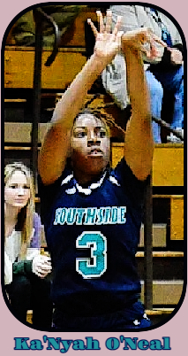 Southside High School's girl basketball player (North Carolina) in blue on blue uniform #3, shooting a shot.