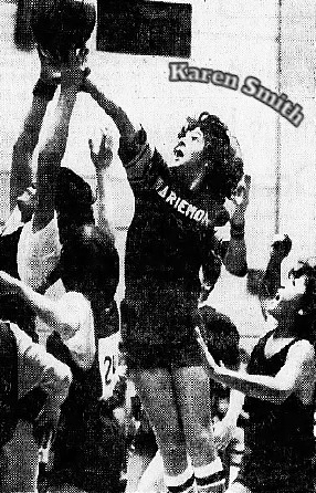 Twelve year old Karen Smith going up for a rebound for her Mariemont Elementary School's boy basketball team in 1974 in Sacramento, CAlifornia. From The Sacramento Bee, March 5, 1974. Photo by Dick Schmidt.