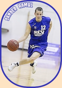 Image of Sander Ramul, Infantry Brigade basketball team in the Lne-Virumaa Estonian County League, #12 in blue uni, crossing over with ball in a game/ Photo: Ain Liiva.