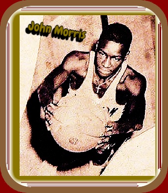 Image of John Morris, basketball player for I.R. Norcom (Portsmouth, Virginia Interscholastic Associated, in the Jim Crow segregated Virginia. Holding a basketball looking up at the camera.) 