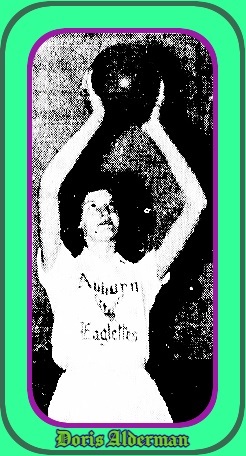 Image of Doris Alderman, girl basketball player in the mid 1950s in Virginia, in her Auburn Eaglette sweatshirt (in Gothic lettering), ball high above her head in shooting mode. From The Roanoke Times, Roanoke, Virginia, March 29, 1956