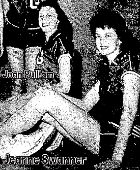 Cropped from team phoo, Jeanne Swanner, Graham High Devilette, seated facing left legs out and knees bent up, looking a camera and smiling. Also shown behind her, teammate Joan Pulliam. From The Daily Times-News, Burlington, North Carolina, February 11, 1959.