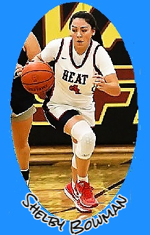Shelby Bowman, girls basketball playere,West Central High School (Illinois) coming towards us with basketball in HEAT uniform #4.