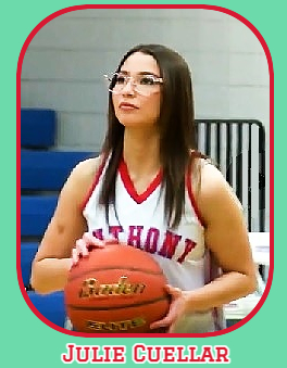 Image of Texan girls basketball player julie Cuellar, Anthony High School Wildcat shown, with eyeglasses, practicing shooting.