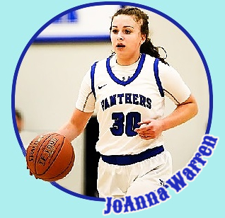 JoAnna Warren, girls basketball player for University Prep (Redding, California), bring the ball upcourt in her whire PANTHERS #30 uniform, blue lettering and trim on white.