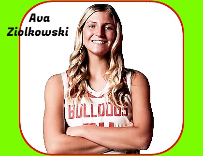 Ava Ziolkowski, girls basketball player on the Crown Point High School (Arizona) team, arms folded in white BULLDOGS jersey.